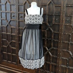 Brand new black, white and rhinestone mesh strapped Cathy Roberts size 14 dress
